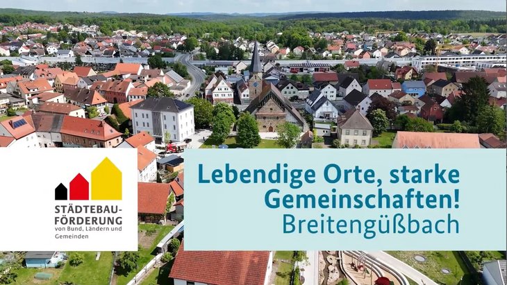 Vor einer Stadtansicht von Breitengüßbach ist ein Banner eingeblendet, auf steht Lebendige Orte, starke Gemeinschaften! Breitengüßbach.